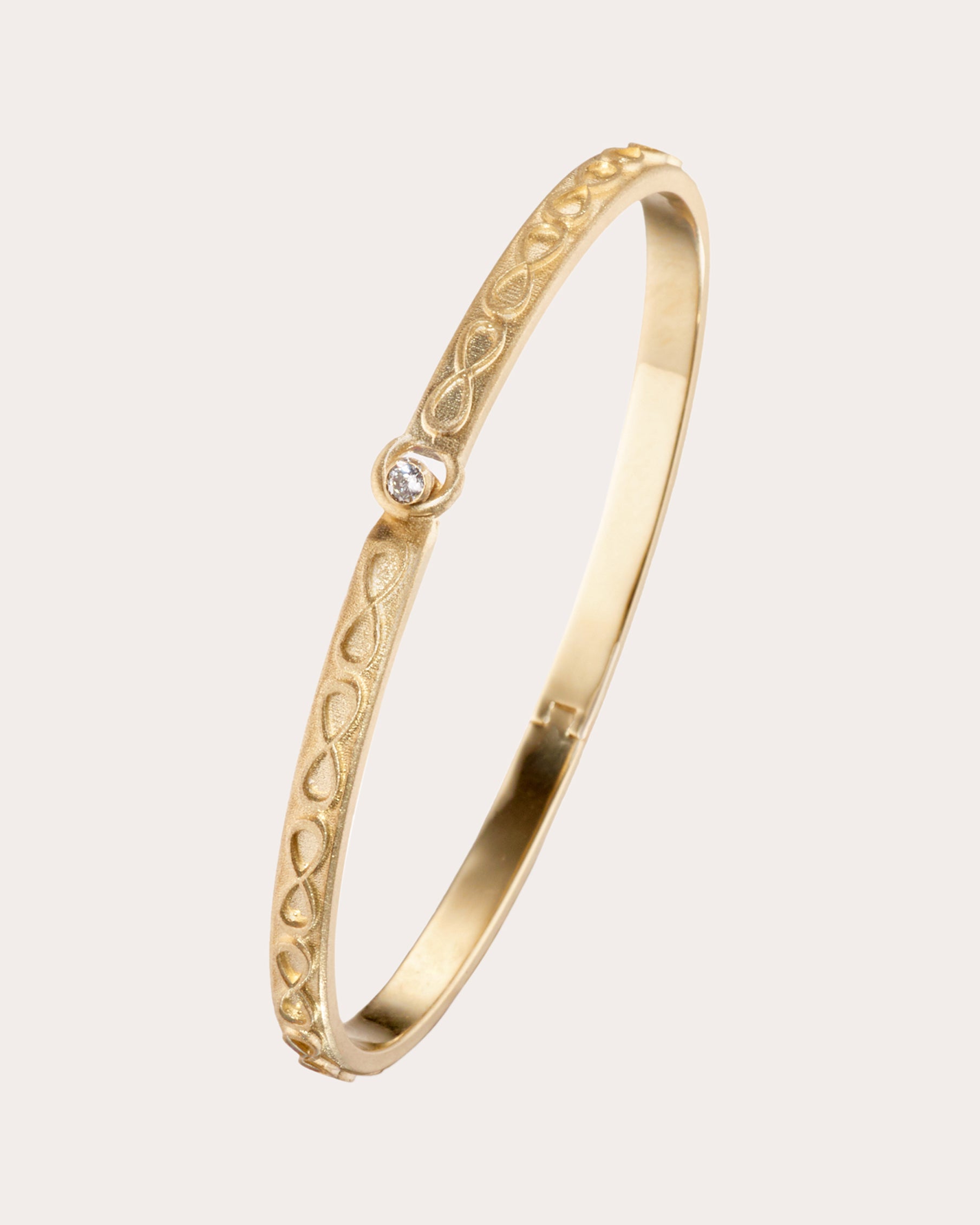 Diamond & 14k Gold Infinity Bangle